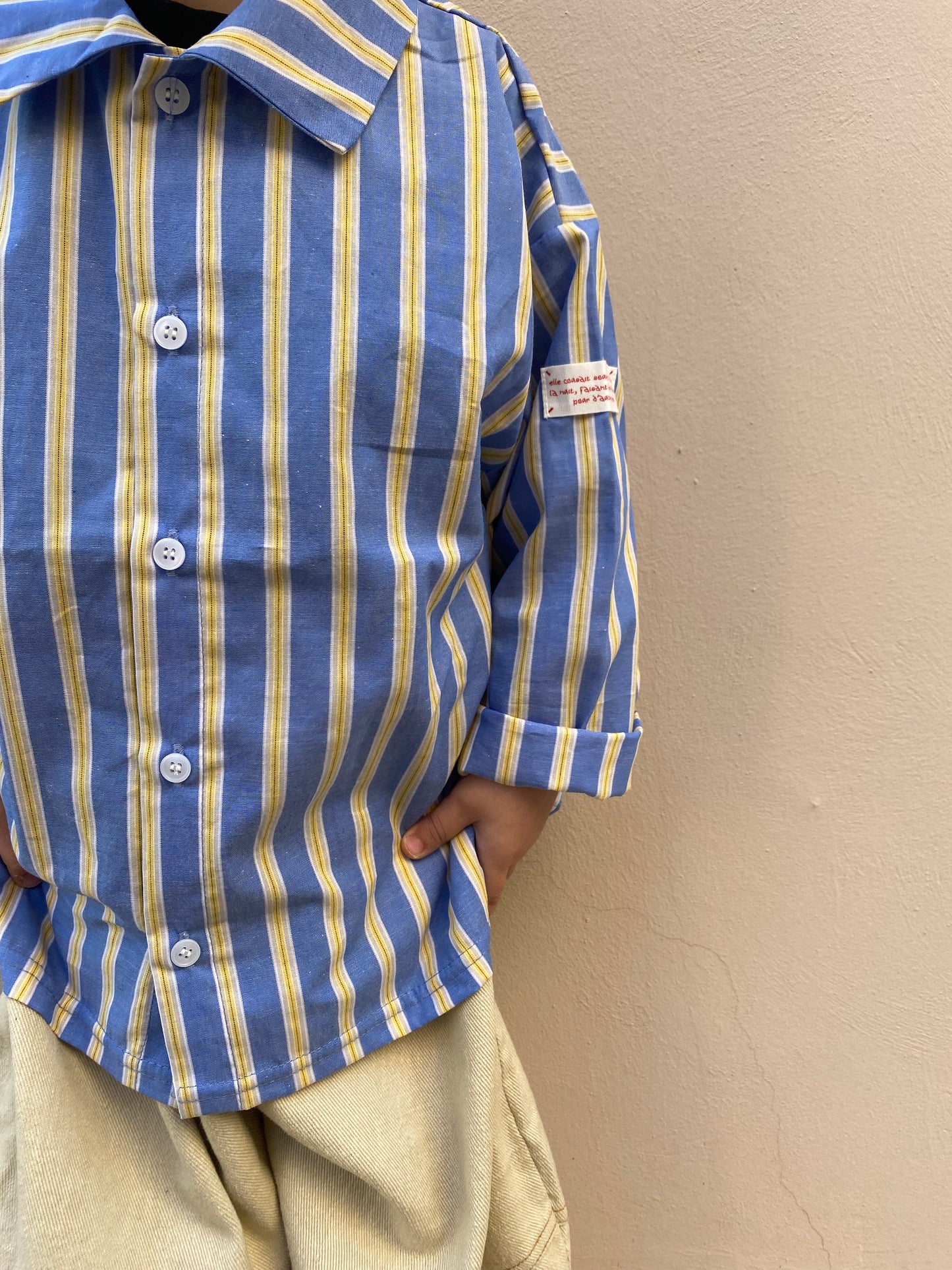 Camicia a righe celeste