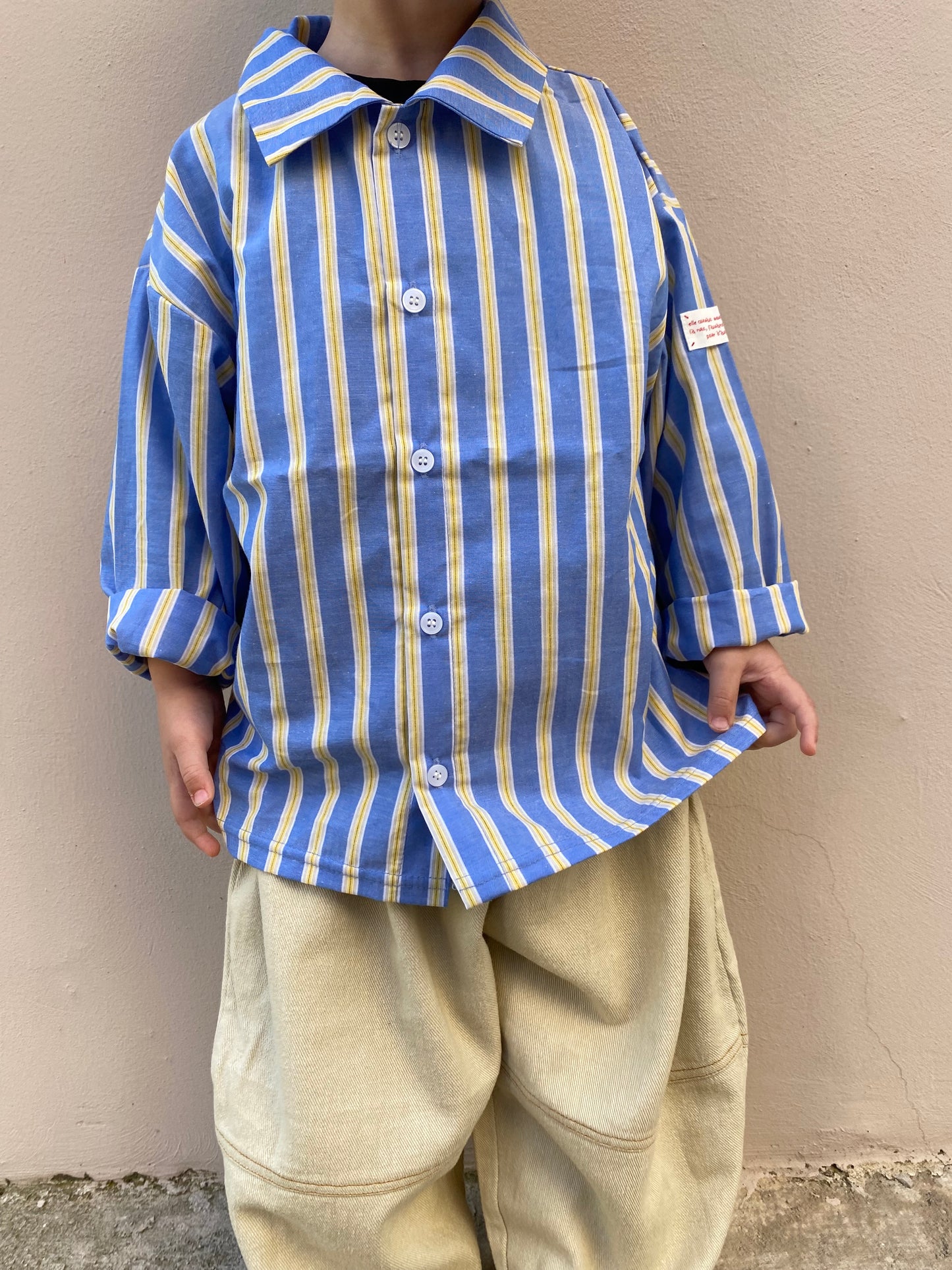 Camicia a righe celeste